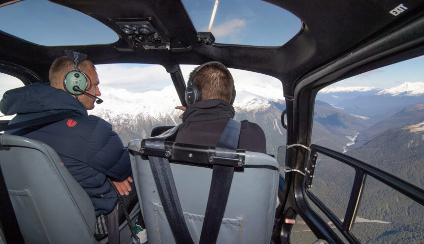 Pilot and passenger flying past Mt Cook
